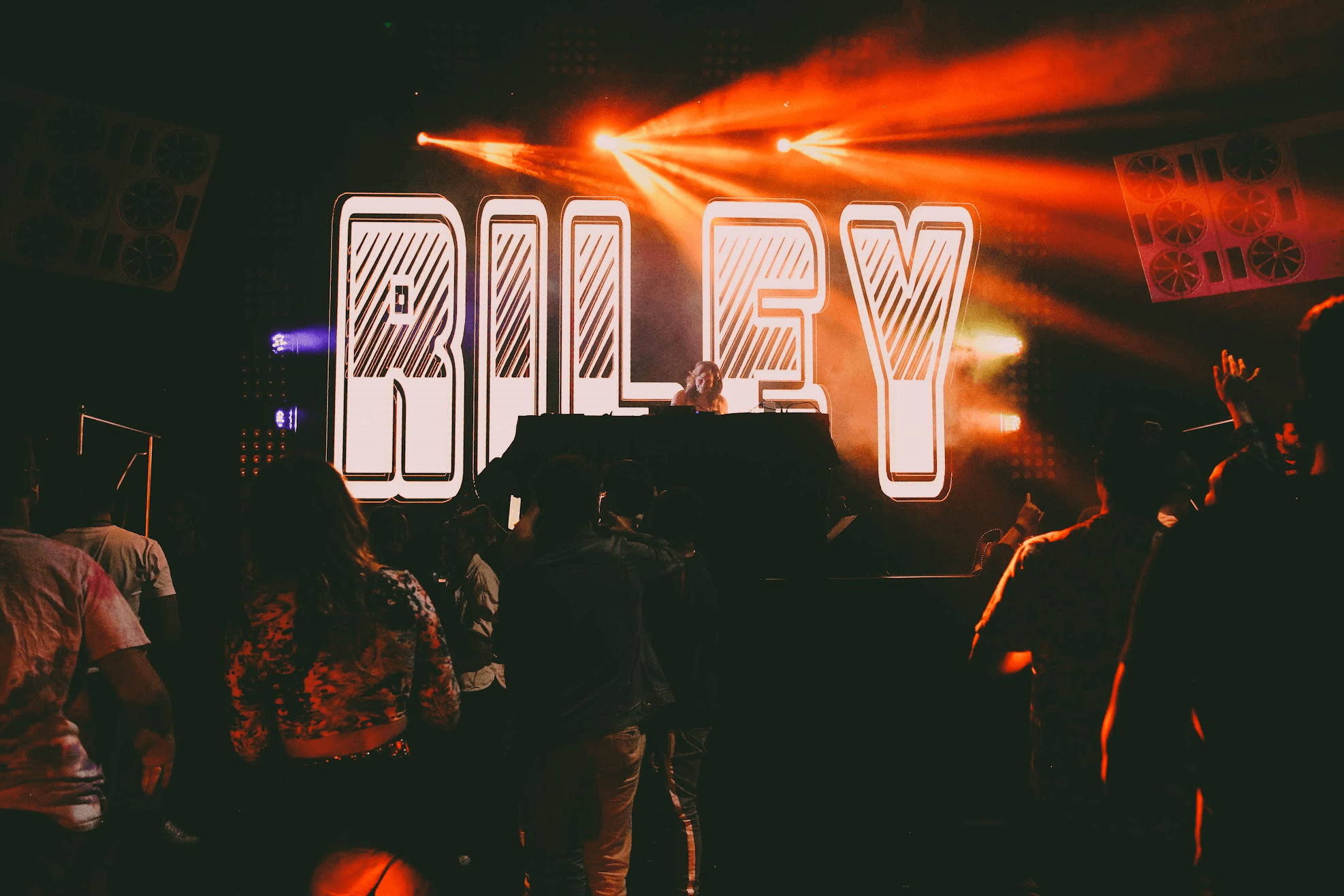 Riley Love performing on stage.